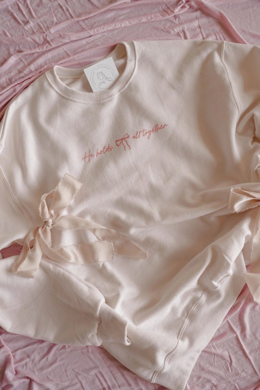 Pink Bow 'He Holds All Together' Ivory Pullover